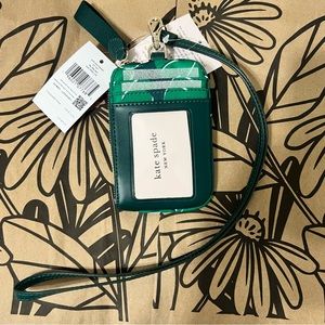 Kate Spade Wristlet In a Green Leaf Pattern